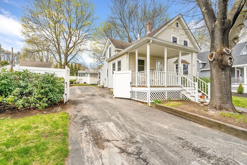 111 Spring Street Marlborough, MA 01752 - Photo 35 of 42 a view of a house with a yard and pathway