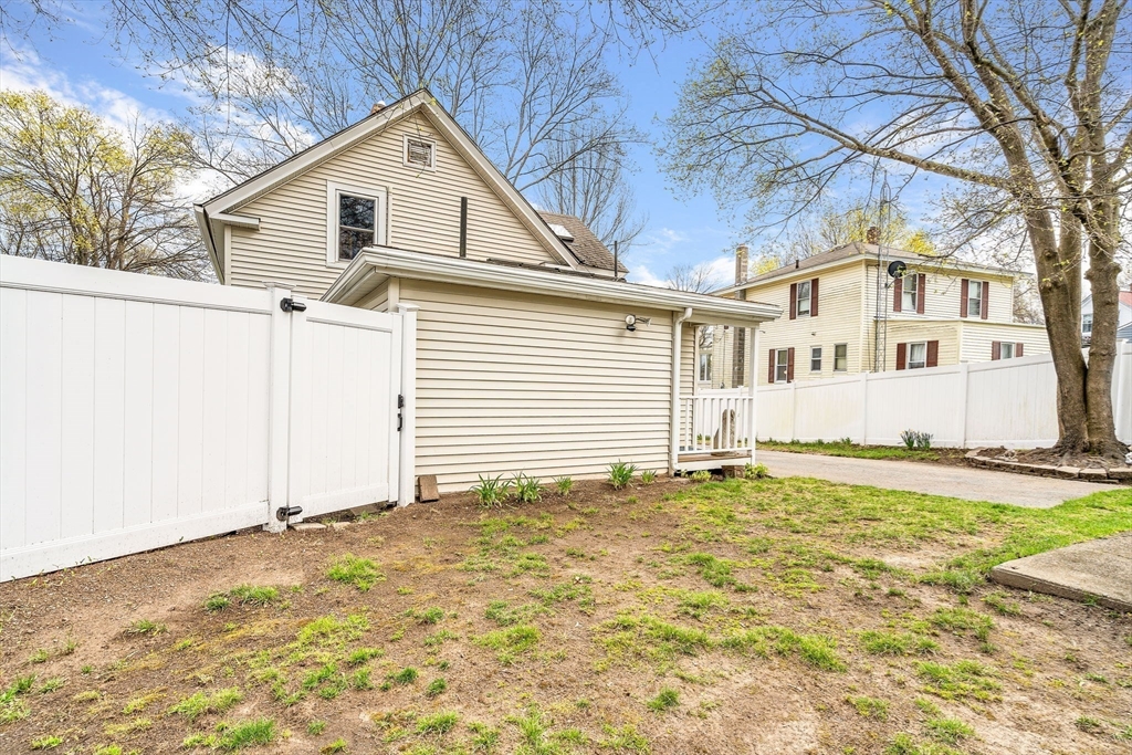 111 Spring Street Marlborough, MA 01752 - Photo 38 of 42 a view of a house with a yard