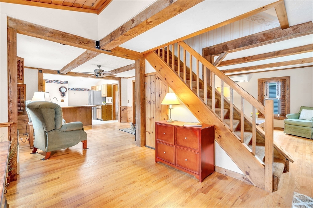 111 Spring Street Marlborough, MA 01752 - Photo 6 of 42 a view of entryway and hall with wooden floor