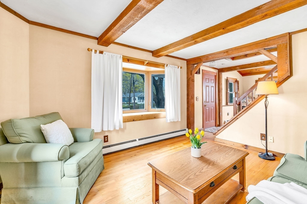 111 Spring Street Marlborough, MA 01752 - Photo 7 of 42 a living room with furniture and a window