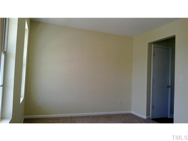 2900 Oneida Court Raleigh, NC 27610 - Photo 4 of 7 a open area with a bench