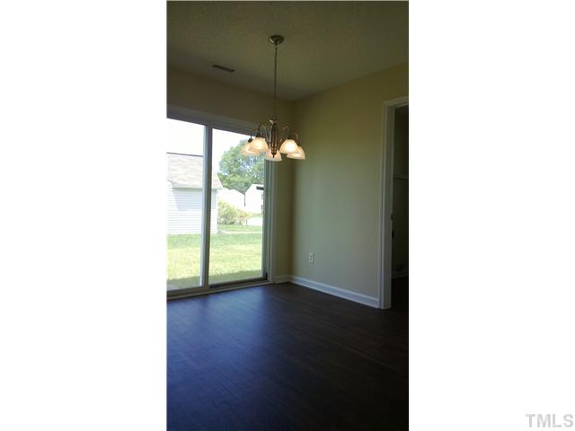 2900 Oneida Court Raleigh, NC 27610 - Photo 5 of 7 a view of a room with a floor to ceiling window