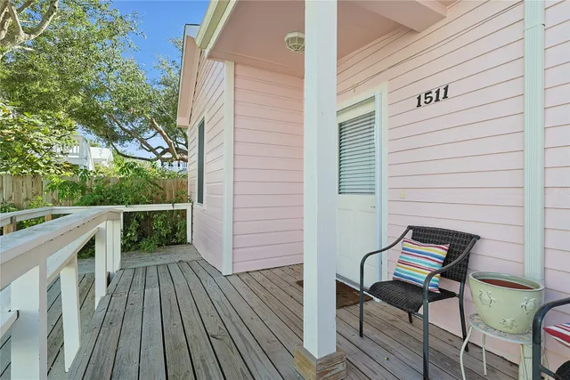 a view of a two chairs in the balcony