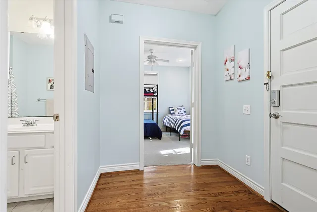 a view of a bedroom from the hallway