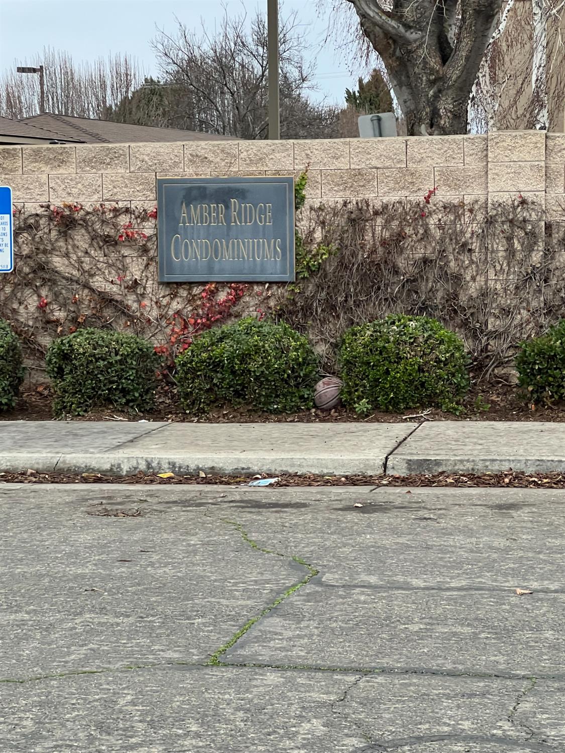 565 Peerless Way, Unit 302 Tracy, CA 95376 - Photo 9 of 17 a view of a street sign