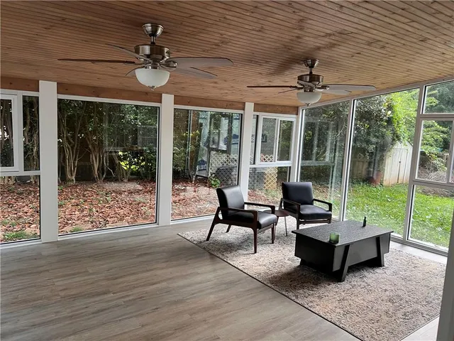 a outdoor living space with furniture and garden view