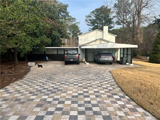 a view of a terrace with sitting area