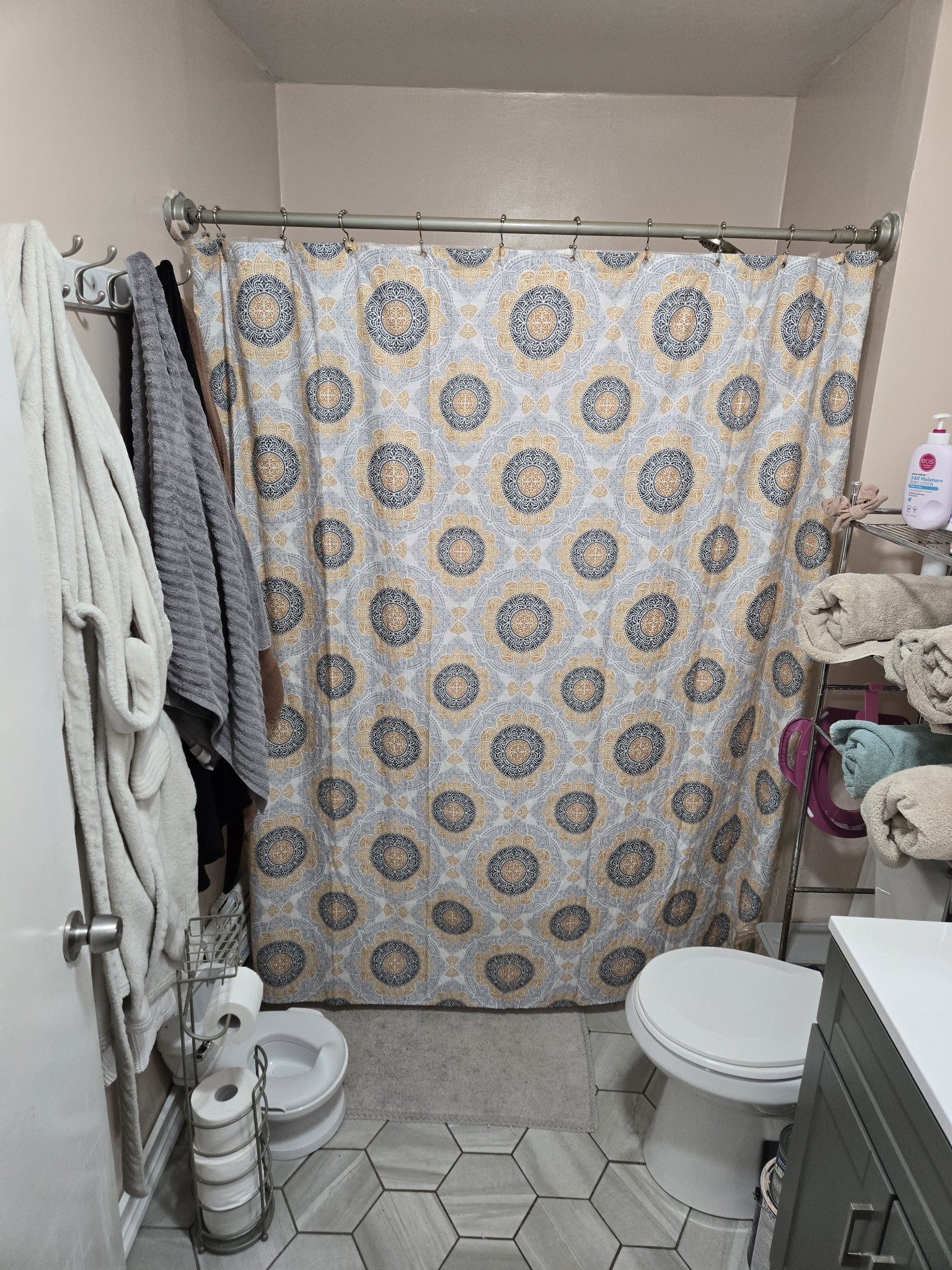 5253 Henley Road Mount Juliet, TN 37122 - Photo 14 of 20 a bathroom with a toilet and a shower curtain