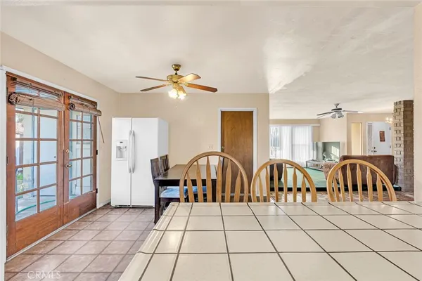 a view of a chairs and table in a room