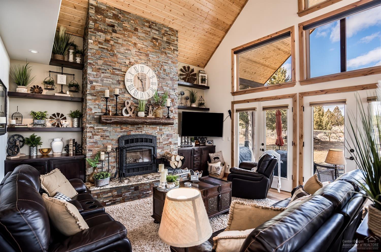 22017 Quebec Court Bend, OR 97702 - Photo 8 of 25 This fireplace boasts a wood burning ins