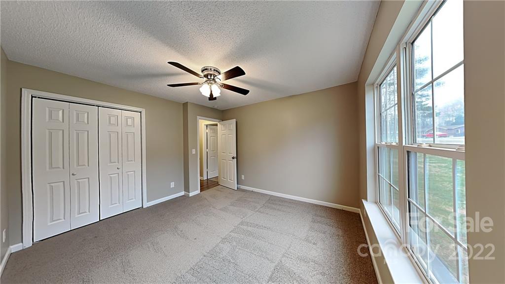 170 State Park Road Troutman, NC 28166 - Photo 8 of 11 a view of an empty room with a window