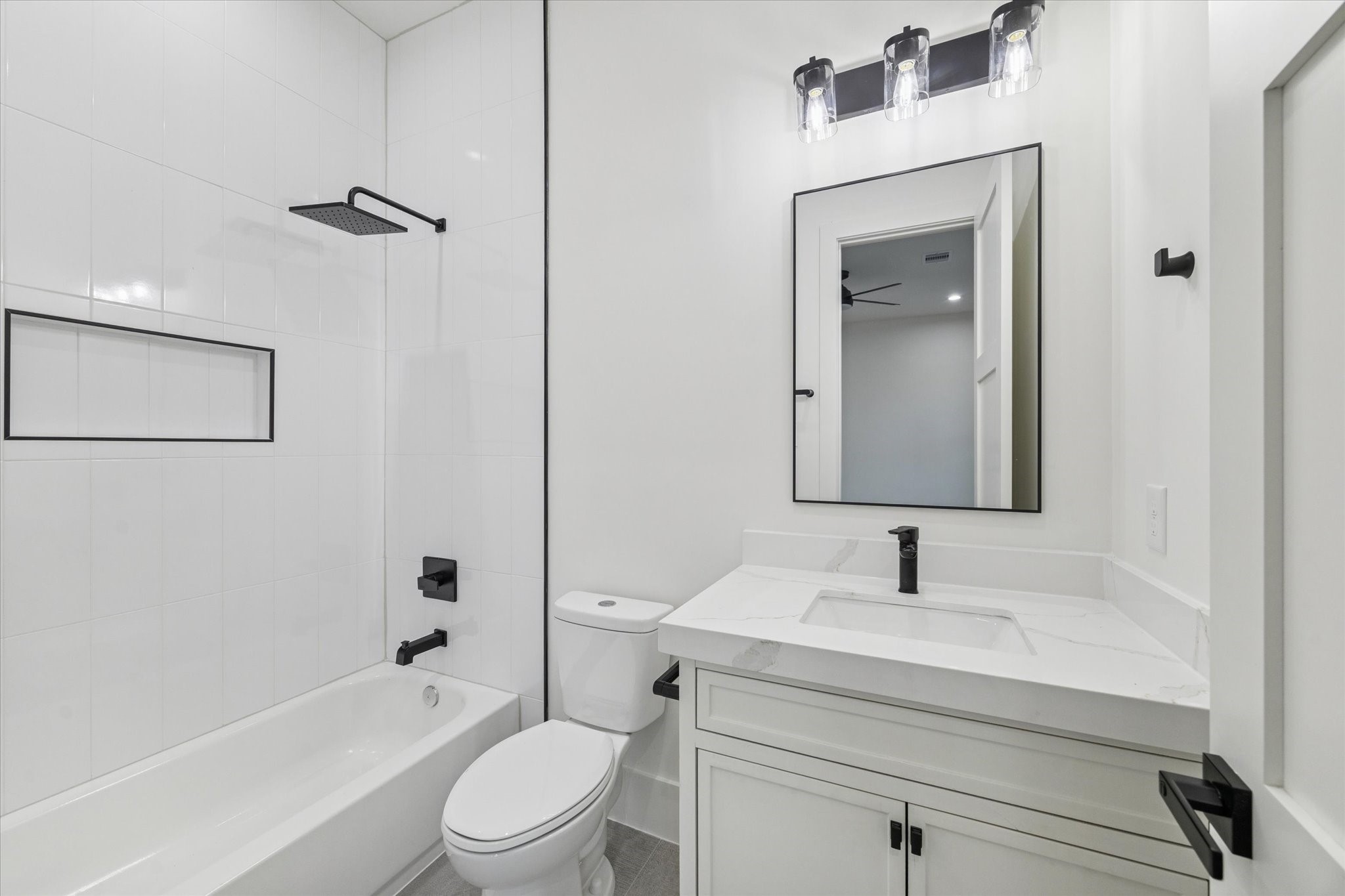 614 Eleanor Street Houston, TX 77009 - Photo 33 of 43 a bathroom with a sink a toilet and shower