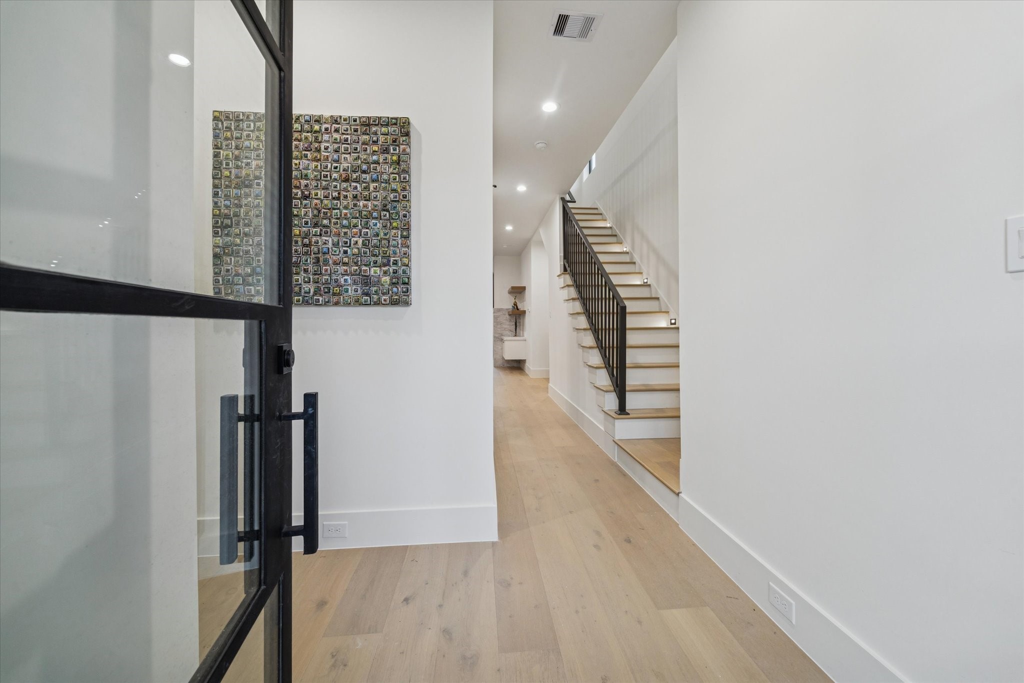 614 Eleanor Street Houston, TX 77009 - Photo 6 of 43 a view of hallway with stairs