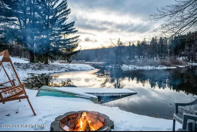 a view of a lounge chair and table in the patio