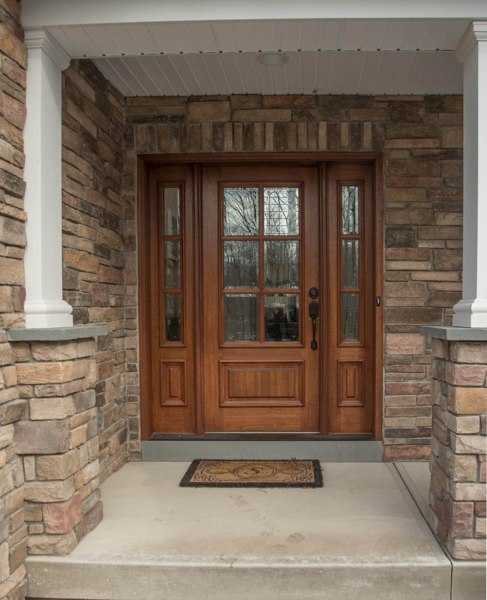 121 Highland Road Moscow, PA 18444 - Photo 2 of 93 a view of a brick house with a outdoor space