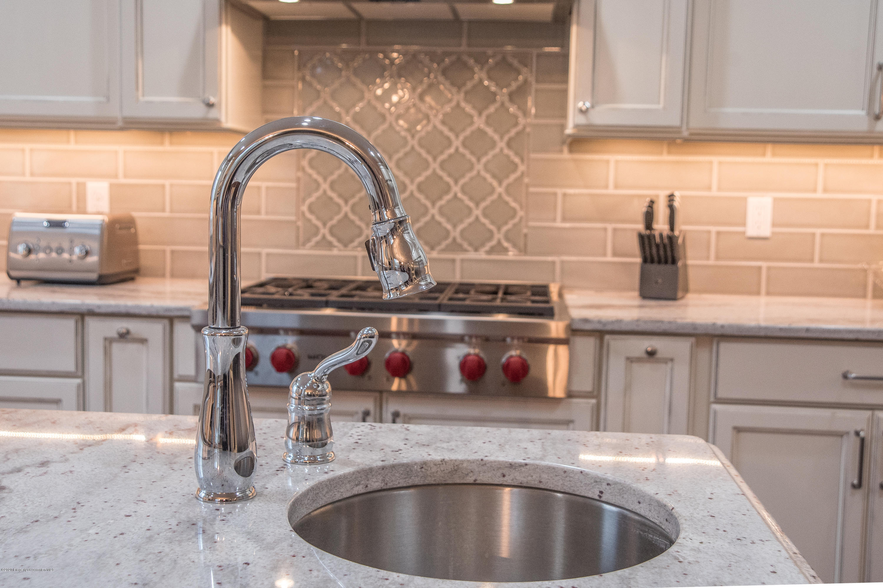 121 Highland Road Moscow, PA 18444 - Photo 23 of 93 a kitchen with a sink and cabinets