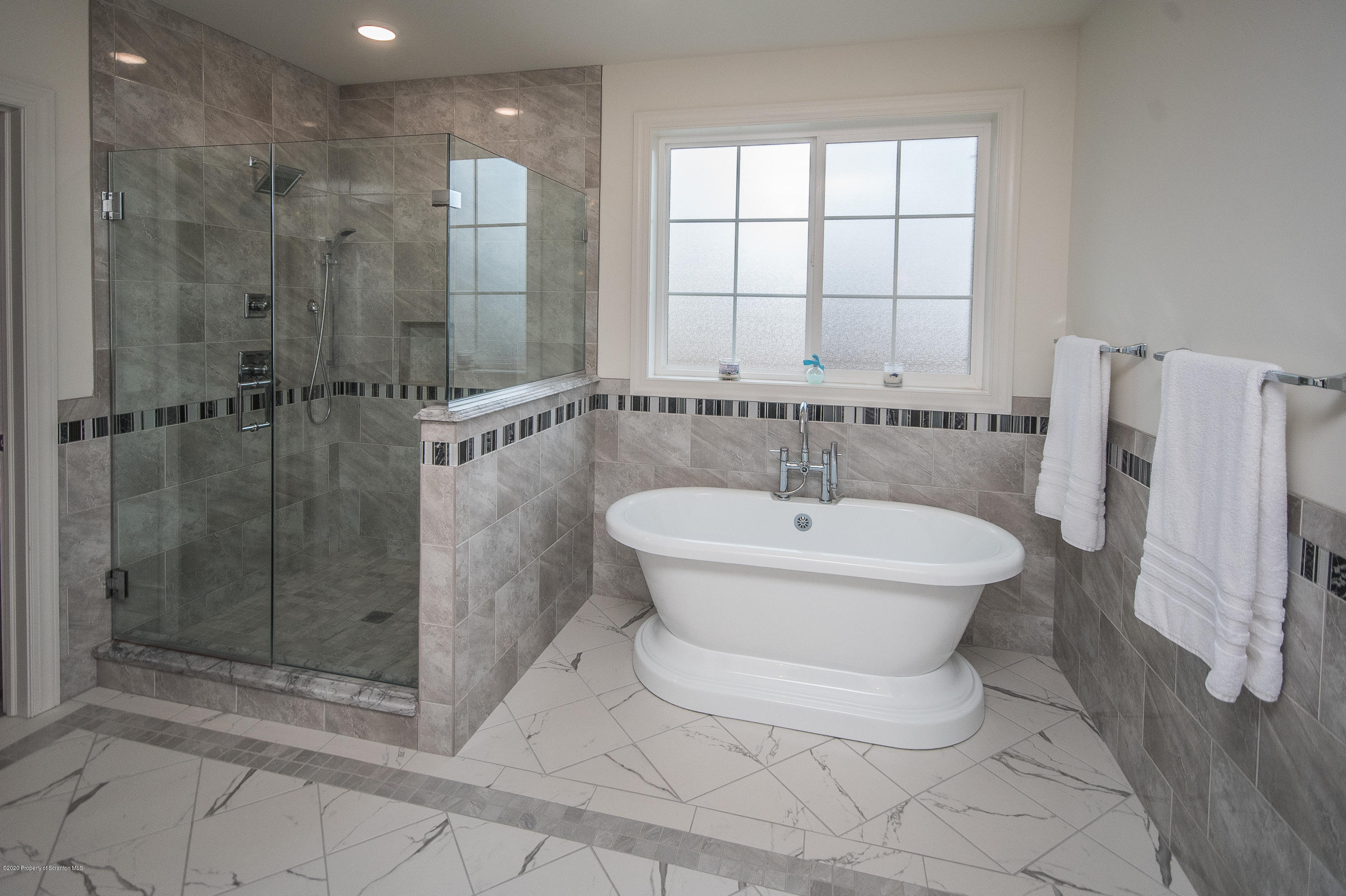 121 Highland Road Moscow, PA 18444 - Photo 51 of 93 a bathroom with a bathtub and shower
