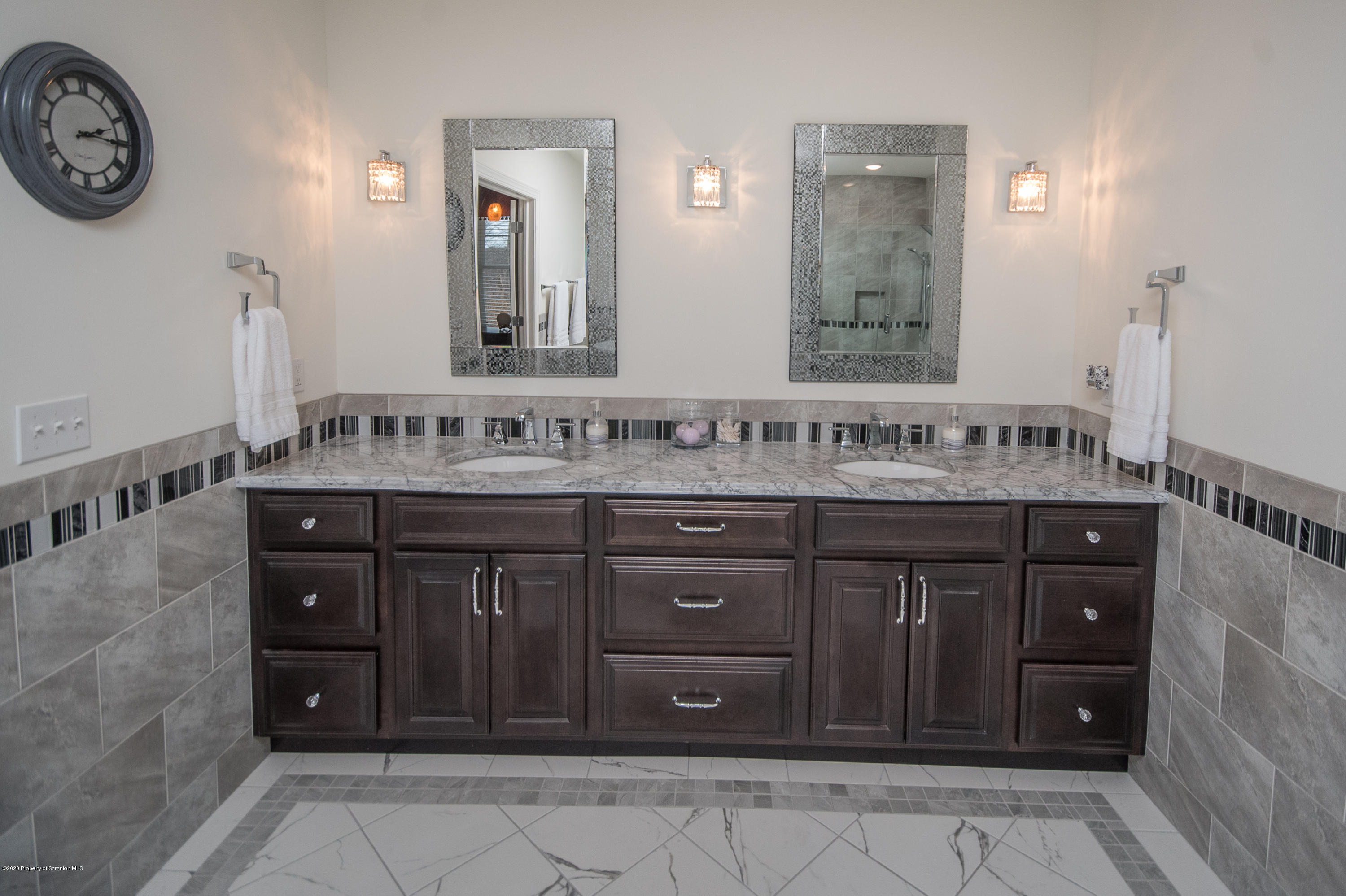 121 Highland Road Moscow, PA 18444 - Photo 53 of 93 a bathroom with a sink vanity and a mirror