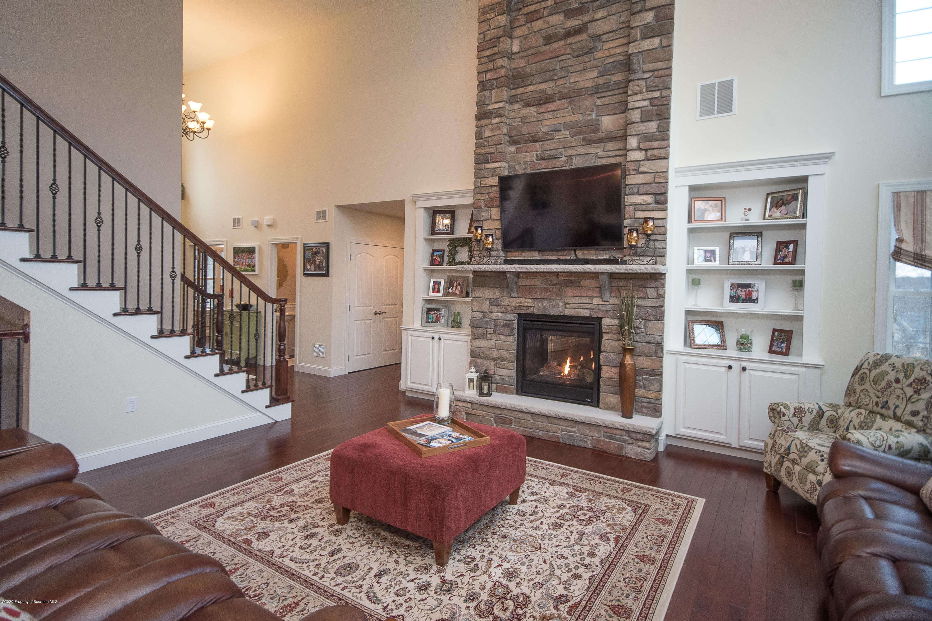 121 Highland Road Moscow, PA 18444 - Photo 6 of 93 a living room with furniture and a fireplace
