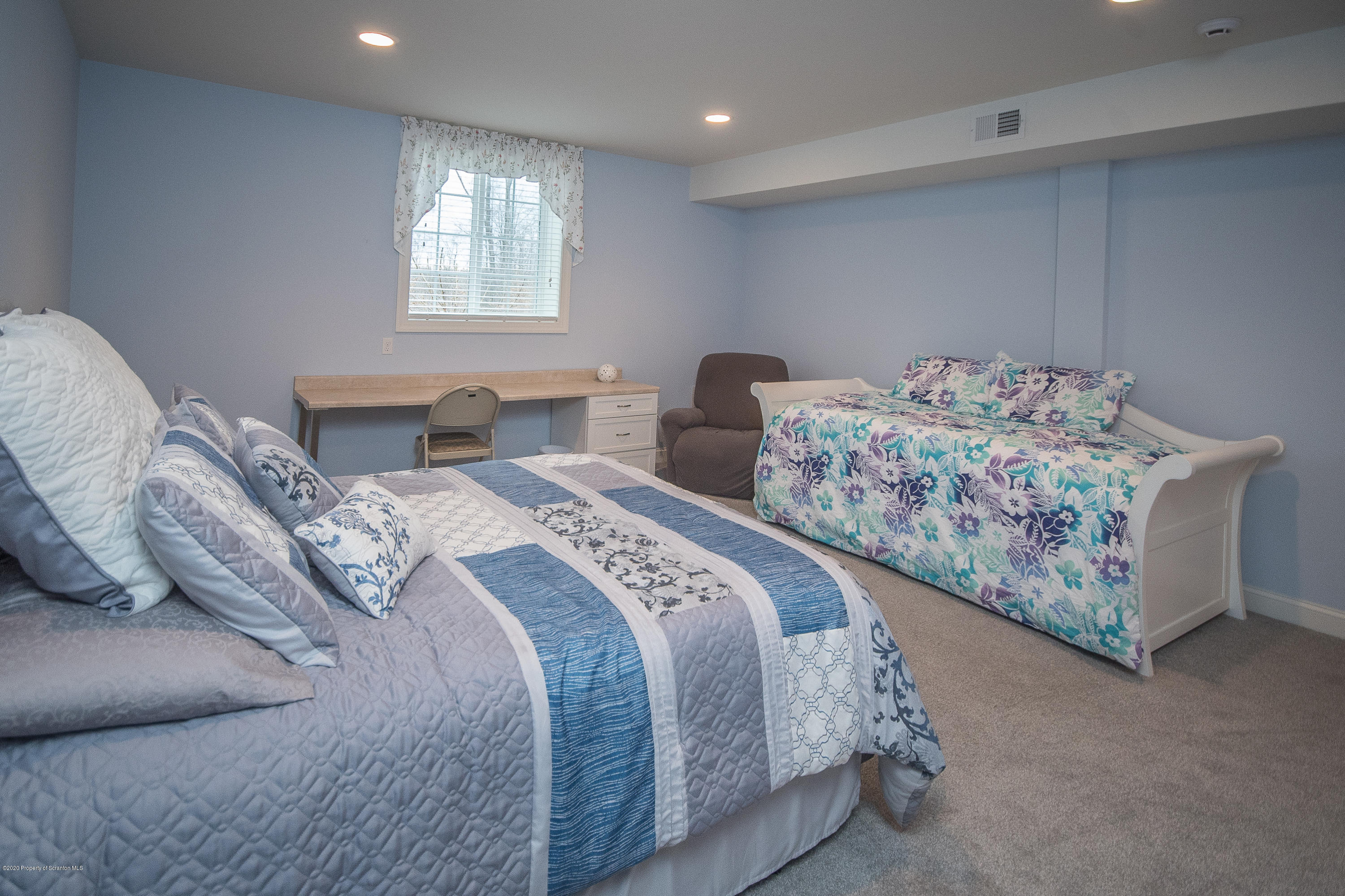 121 Highland Road Moscow, PA 18444 - Photo 66 of 93 a bedroom with two beds and painted walls