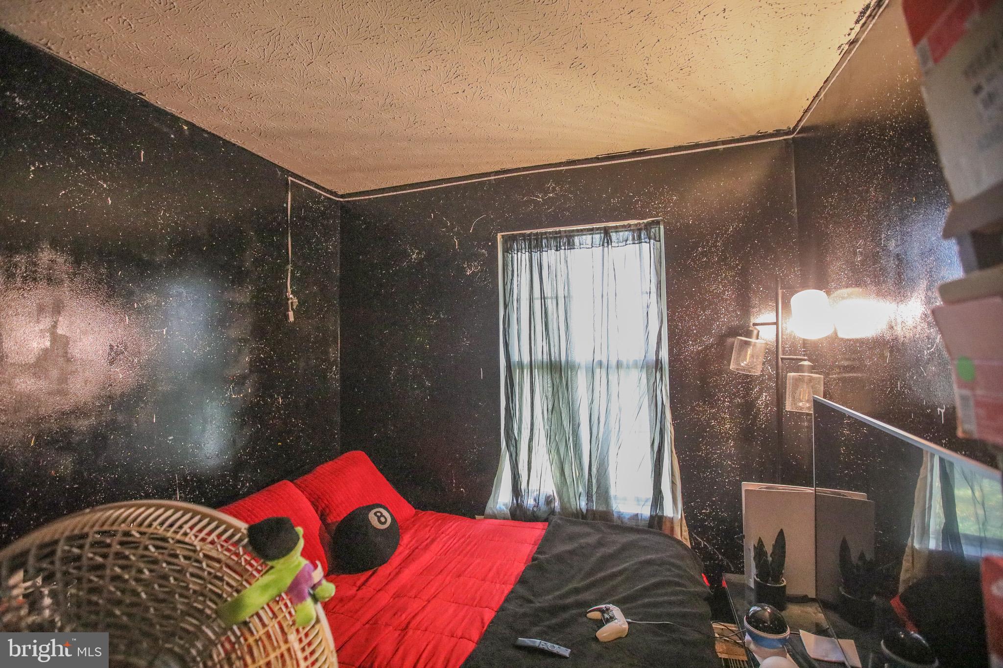 506 Imperial Square Odenton, MD 21113 - Photo 13 of 14 a bedroom with a bed and a window