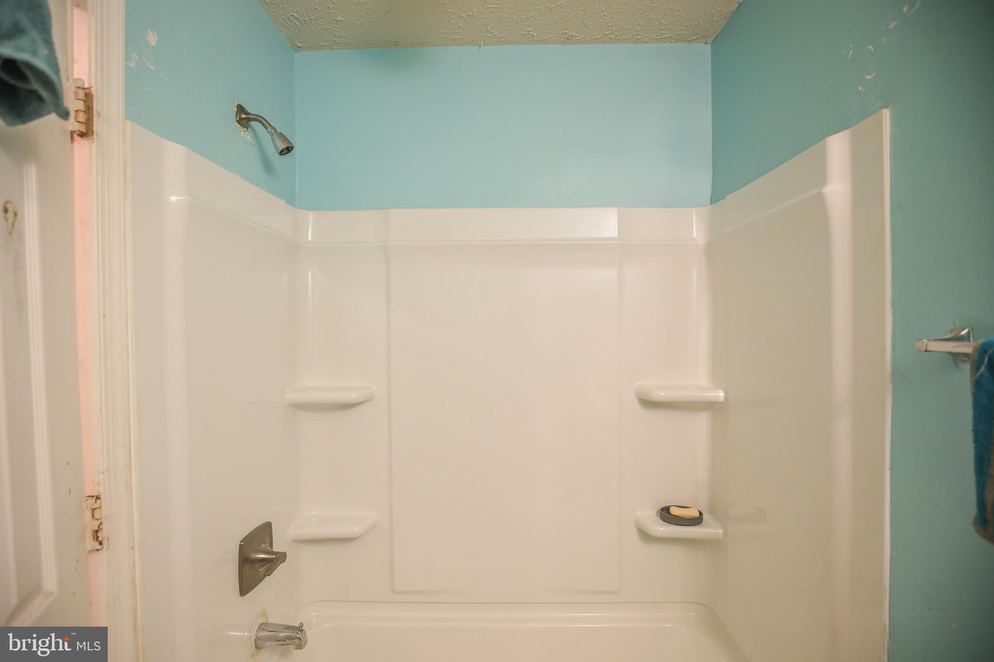 506 Imperial Square Odenton, MD 21113 - Photo 10 of 14 a bathroom with a shower