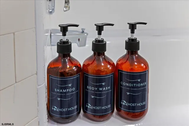 a close view of water heater and wooden cabinets