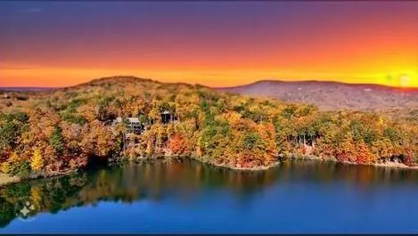a view of a lake with a mountain in the background