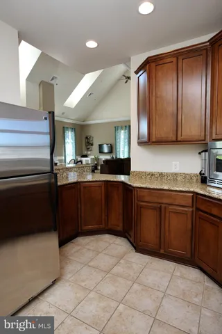 a balcony with furniture and wooden floor