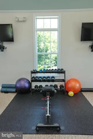 a view of a livingroom with furniture and window