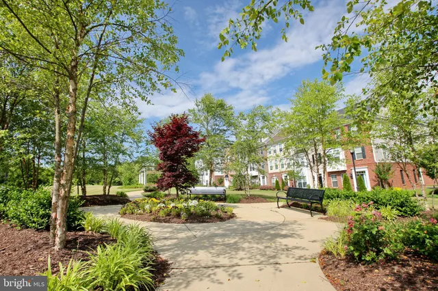 a view of a building with a yard