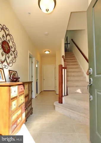 a view of entryway with stairs