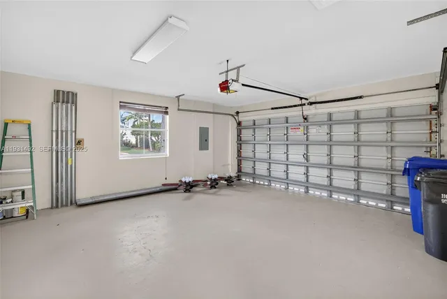 a view of a livingroom with furniture and a window