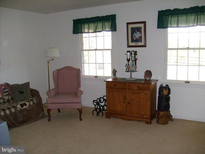 3212 Patapsco Road Finksburg, MD 21048 - Photo 14 of 26 a room with furniture and a window