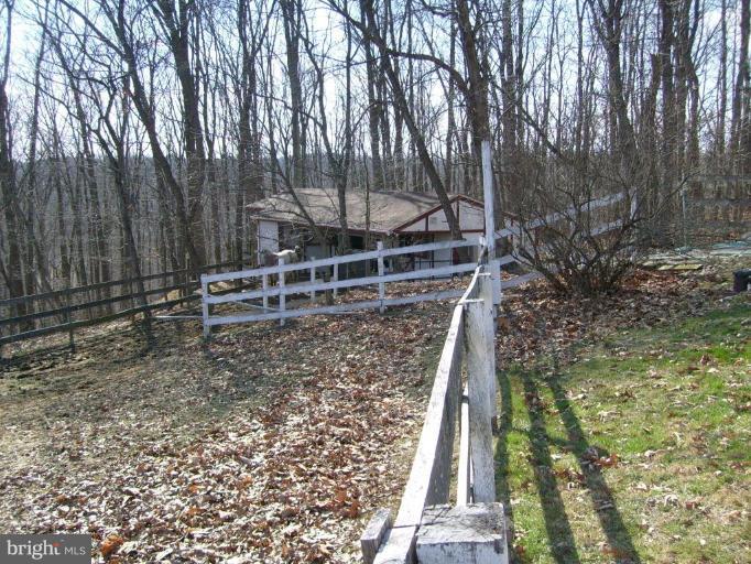 3212 Patapsco Road Finksburg, MD 21048 - Photo 4 of 26 a backyard of a house with lots of green space