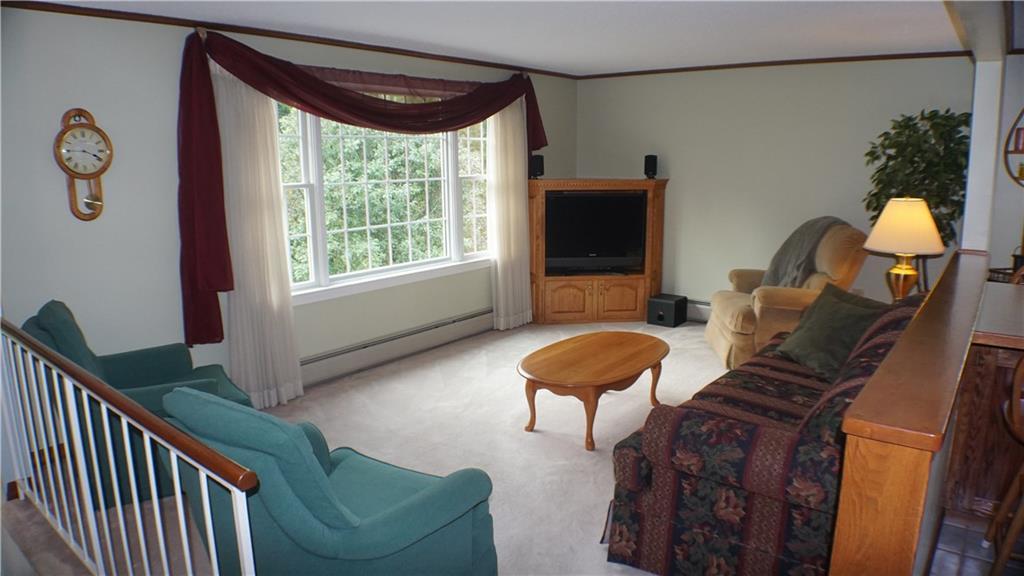 332 Aroostook Road Fort Kent, ME 04743 - Photo 8 of 34 Bright living room open to kitchen