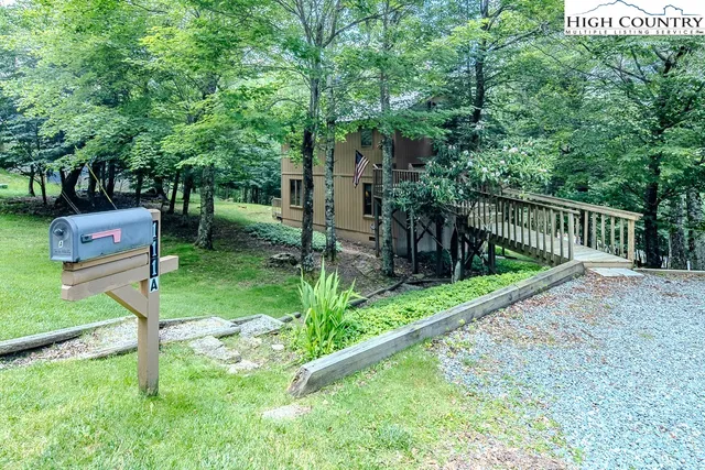 a view of a backyard with a garden