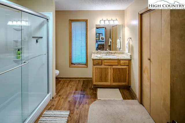 a bathroom with a tub and shower
