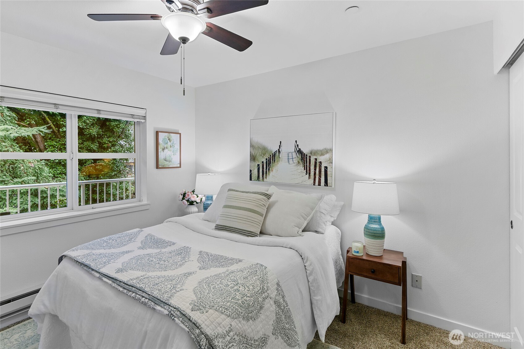 300 High School Road Northeast, Unit 314 Bainbridge Island, WA 98110 - Photo 20 of 36 a bedroom with a bed and a window