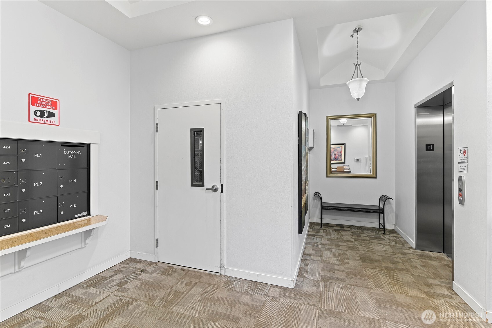 300 High School Road Northeast, Unit 314 Bainbridge Island, WA 98110 - Photo 30 of 36 a view of a hallway with front door