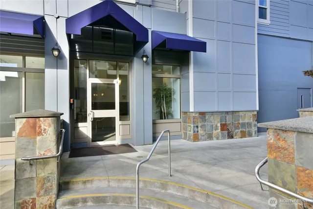 a view of a building with sitting area