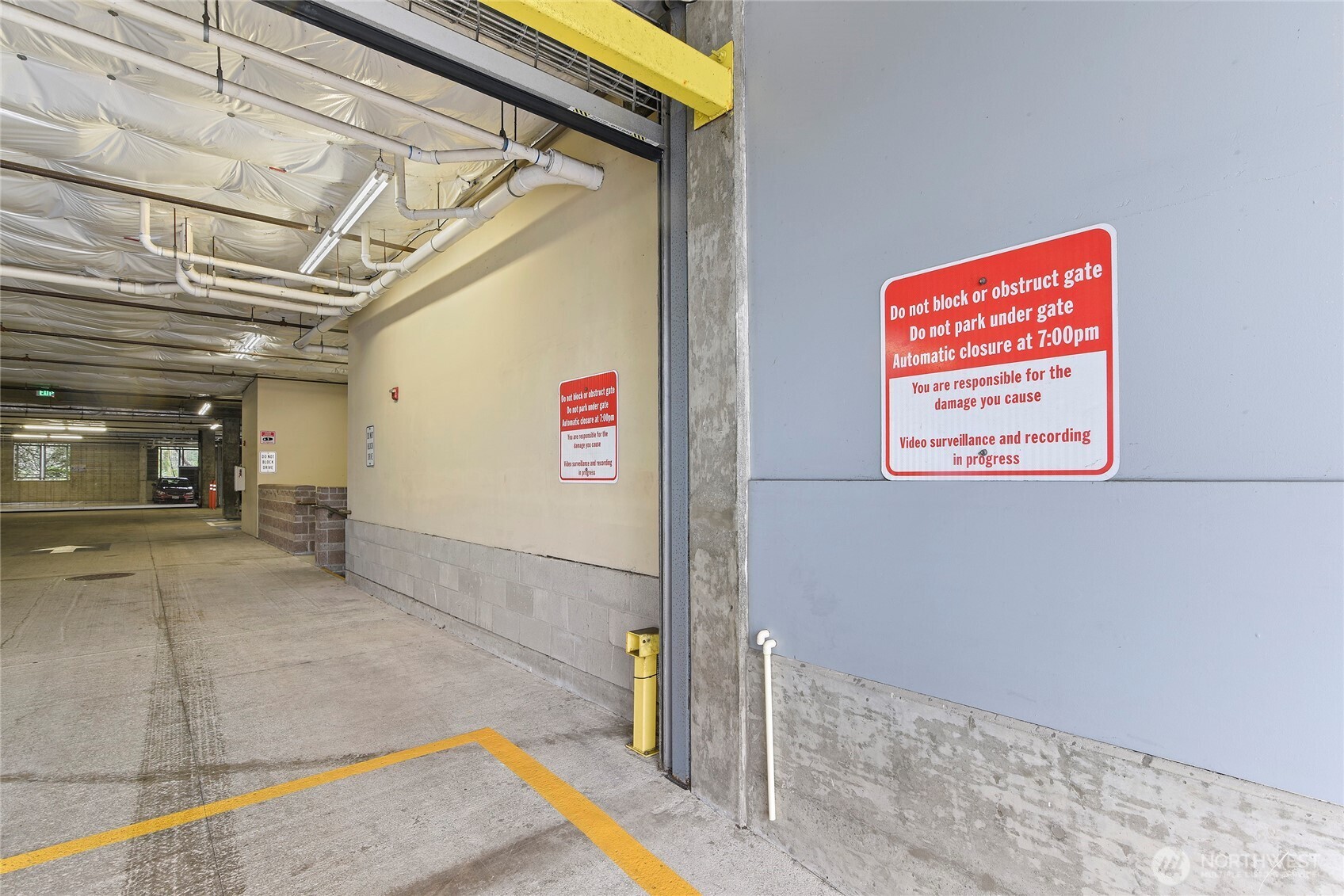 300 High School Road Northeast, Unit 314 Bainbridge Island, WA 98110 - Photo 33 of 36 a view of a hallway with wooden floor