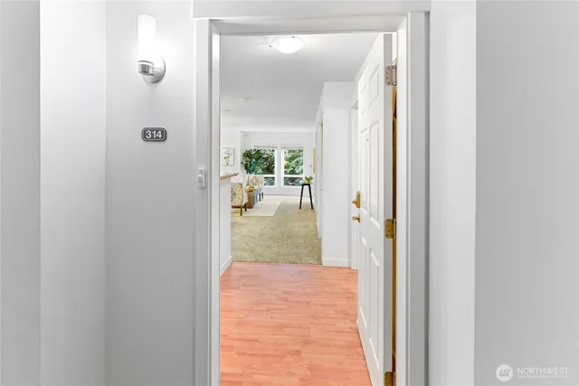a room with sink and cabinets