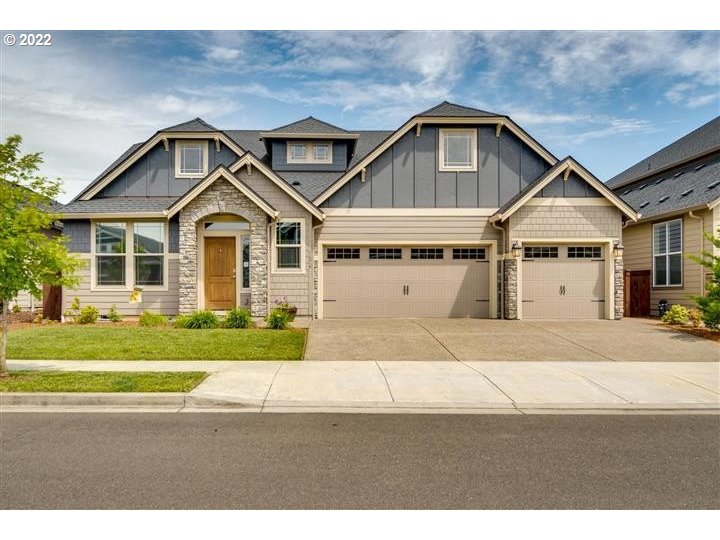 1626 South 46th Place Ridgefield, WA 98642 - Photo 1 of 32 a front view of a house with a yard