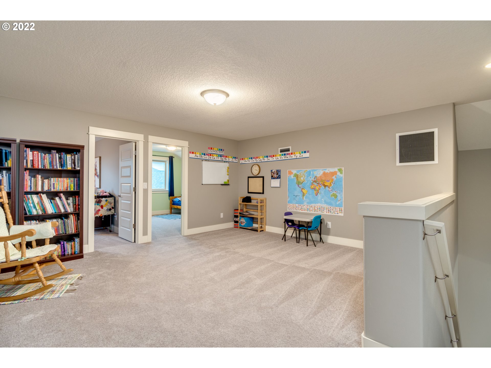 1626 South 46th Place Ridgefield, WA 98642 - Photo 17 of 32 a view of a livingroom with workspace and a couch
