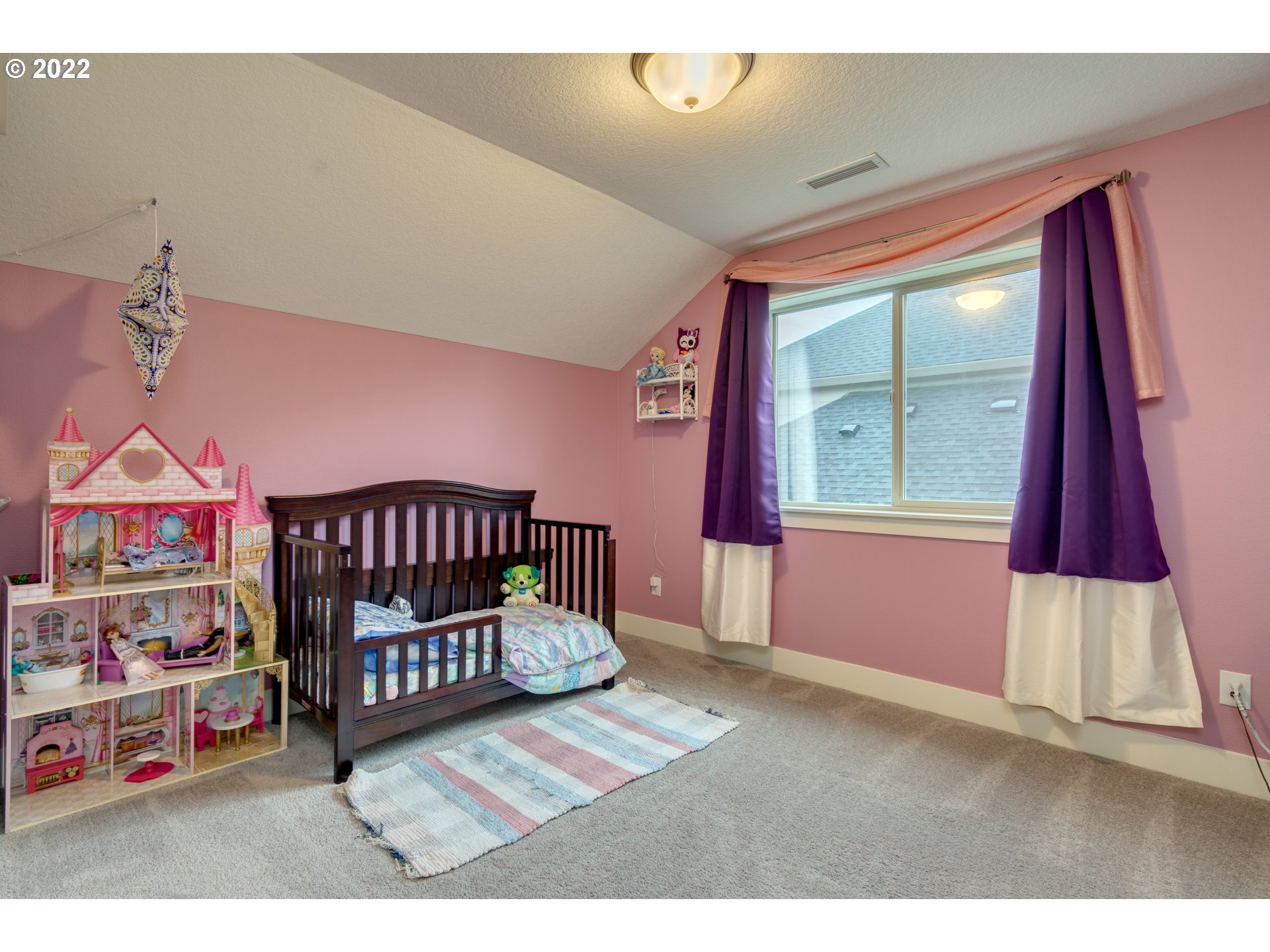 1626 South 46th Place Ridgefield, WA 98642 - Photo 21 of 32 a bedroom with furniture and a window