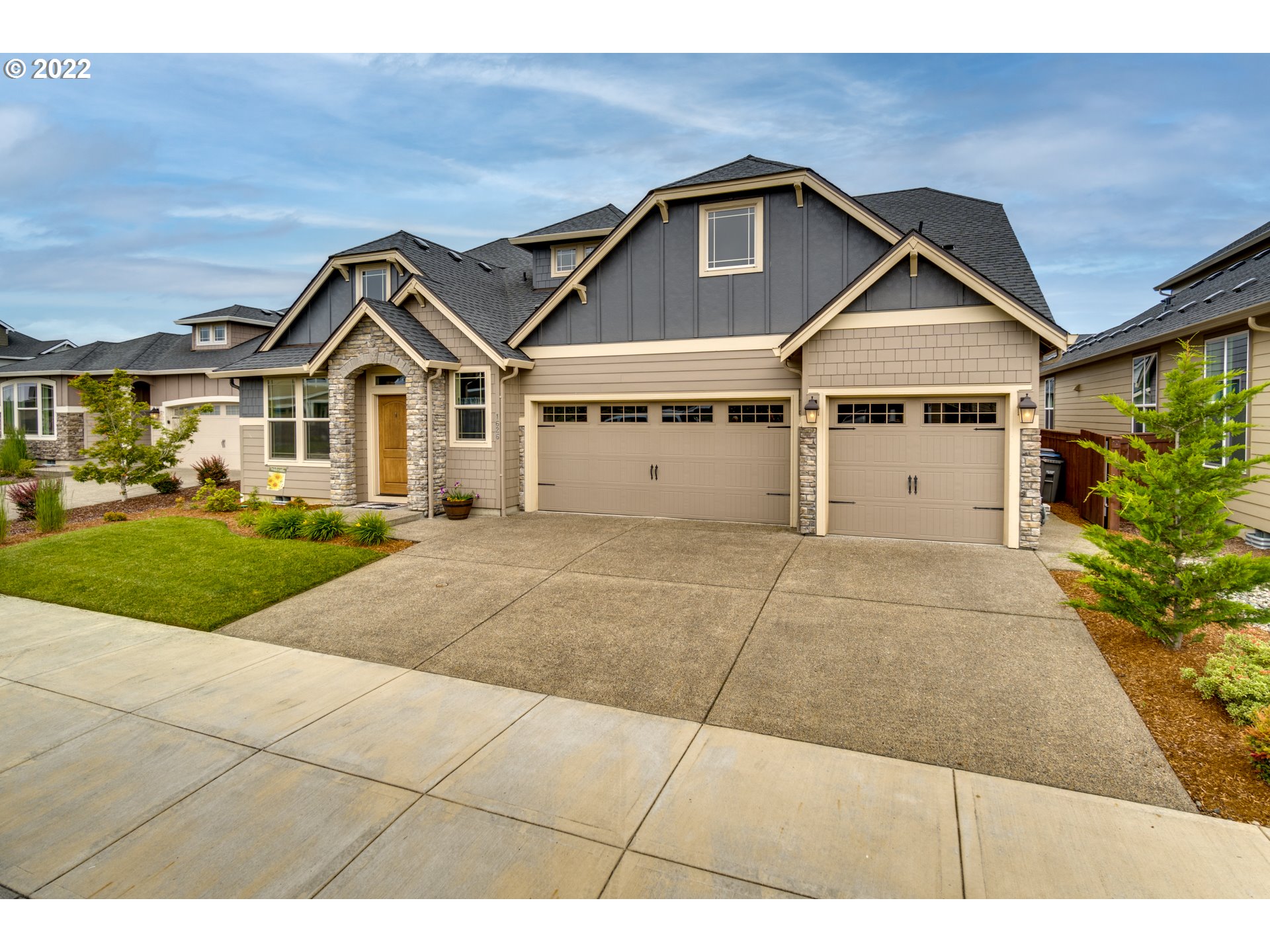 1626 South 46th Place Ridgefield, WA 98642 - Photo 32 of 32 a view of a yard in front of a house