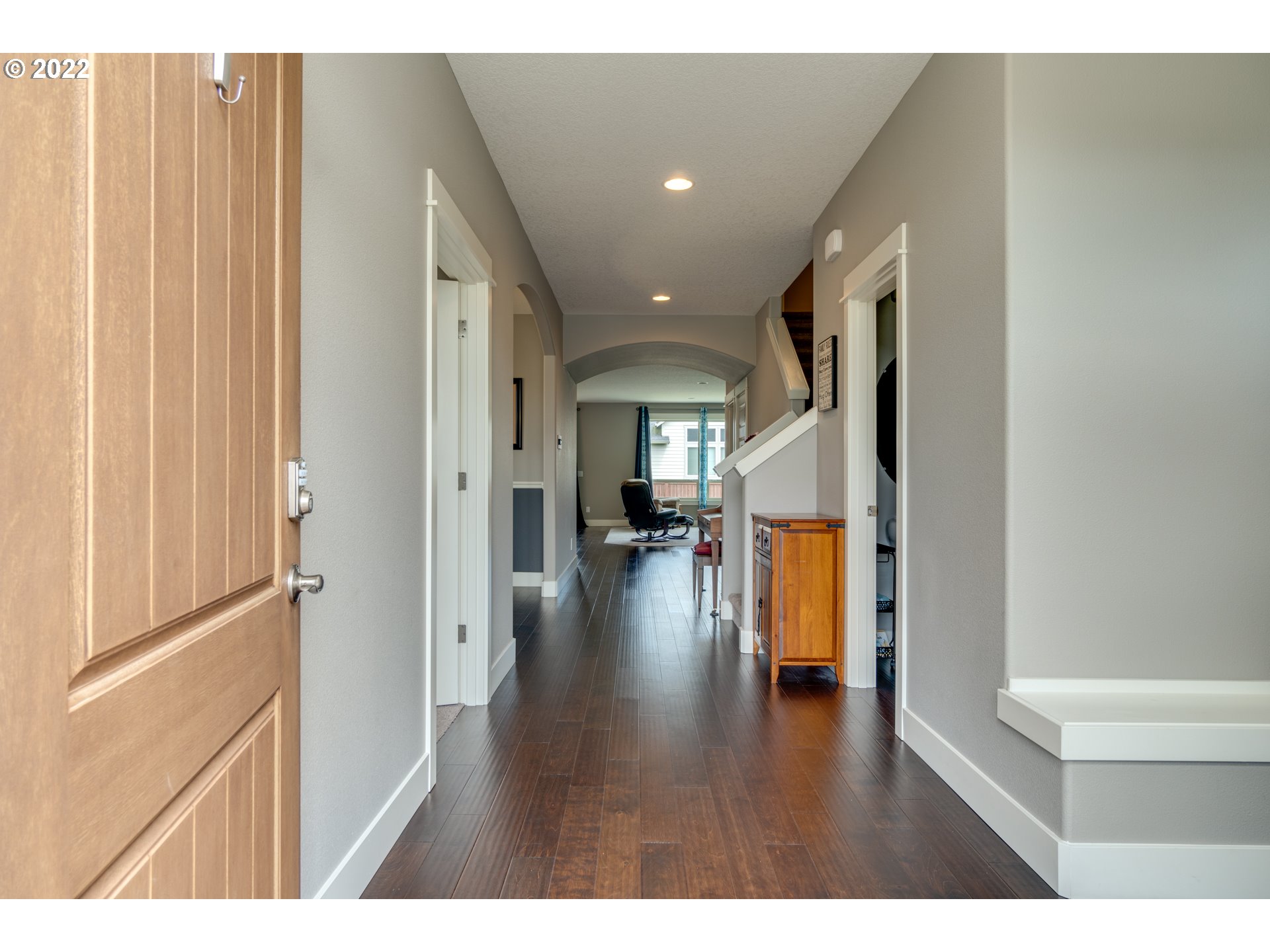 1626 South 46th Place Ridgefield, WA 98642 - Photo 4 of 32 a view of an entryway of a house and wooden floor