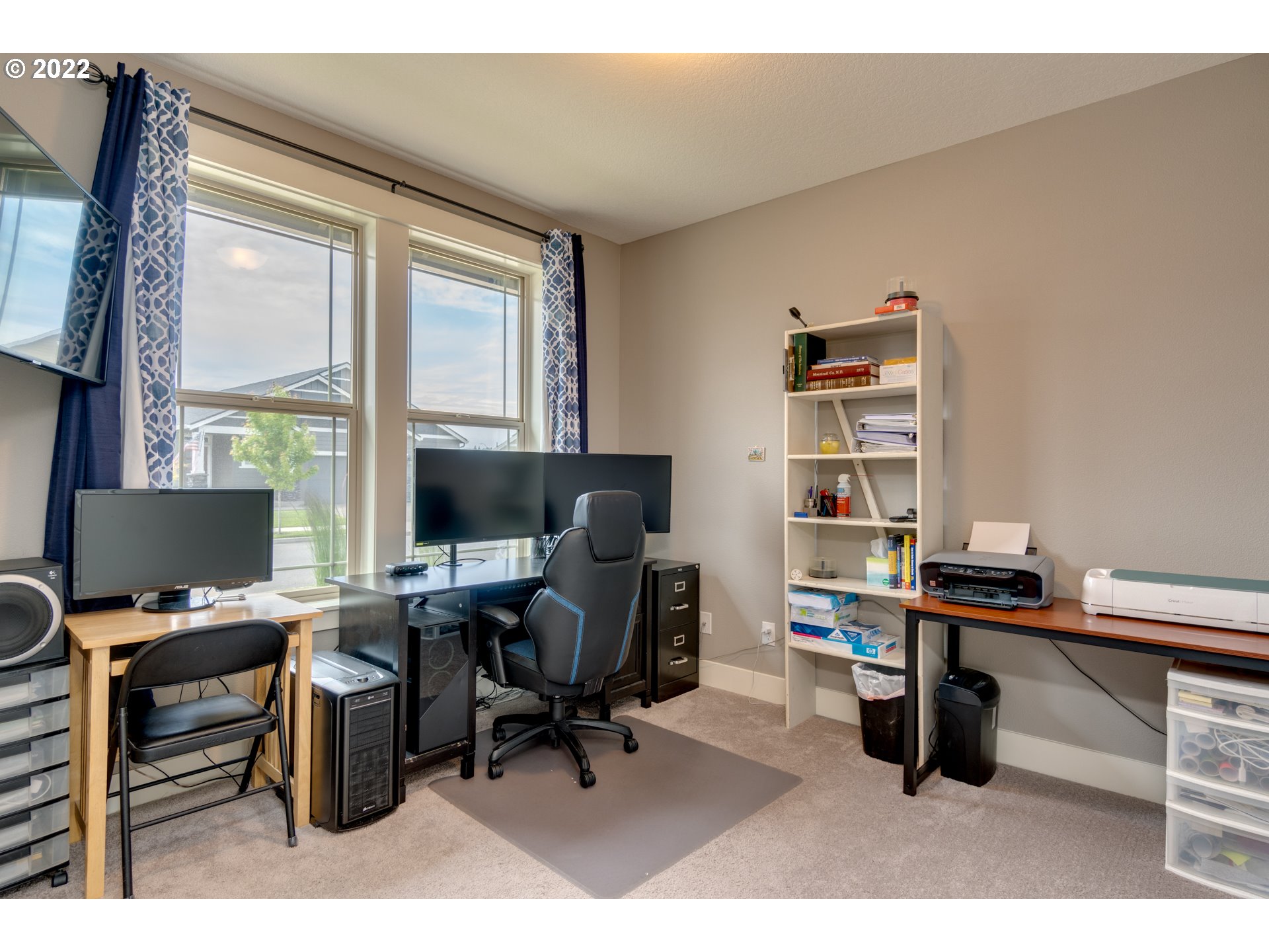 1626 South 46th Place Ridgefield, WA 98642 - Photo 6 of 32 a view of a workspace with furniture and a window