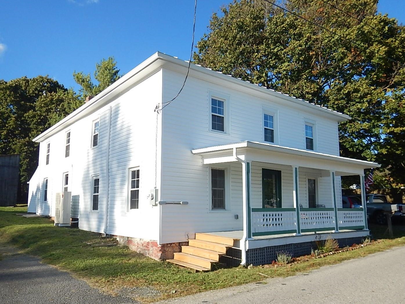 3653 Middlebrook Village Road Middlebrook, VA 24459 - Photo 1 of 48 a view of a white house with a yard